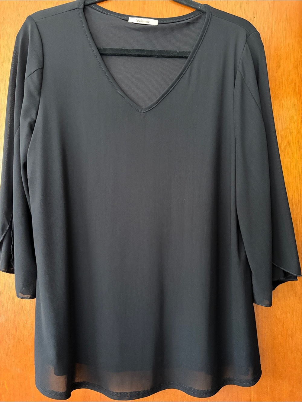 Black V-Neck Women's Blouse with Flowing Three-Quarter Sleeves